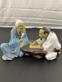Porcelain Figurine of Two Scholars Playing Go