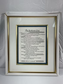 Framed inspirational print titled "The Bottom Line,"