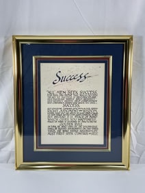 Framed inspirational print titled "Success"