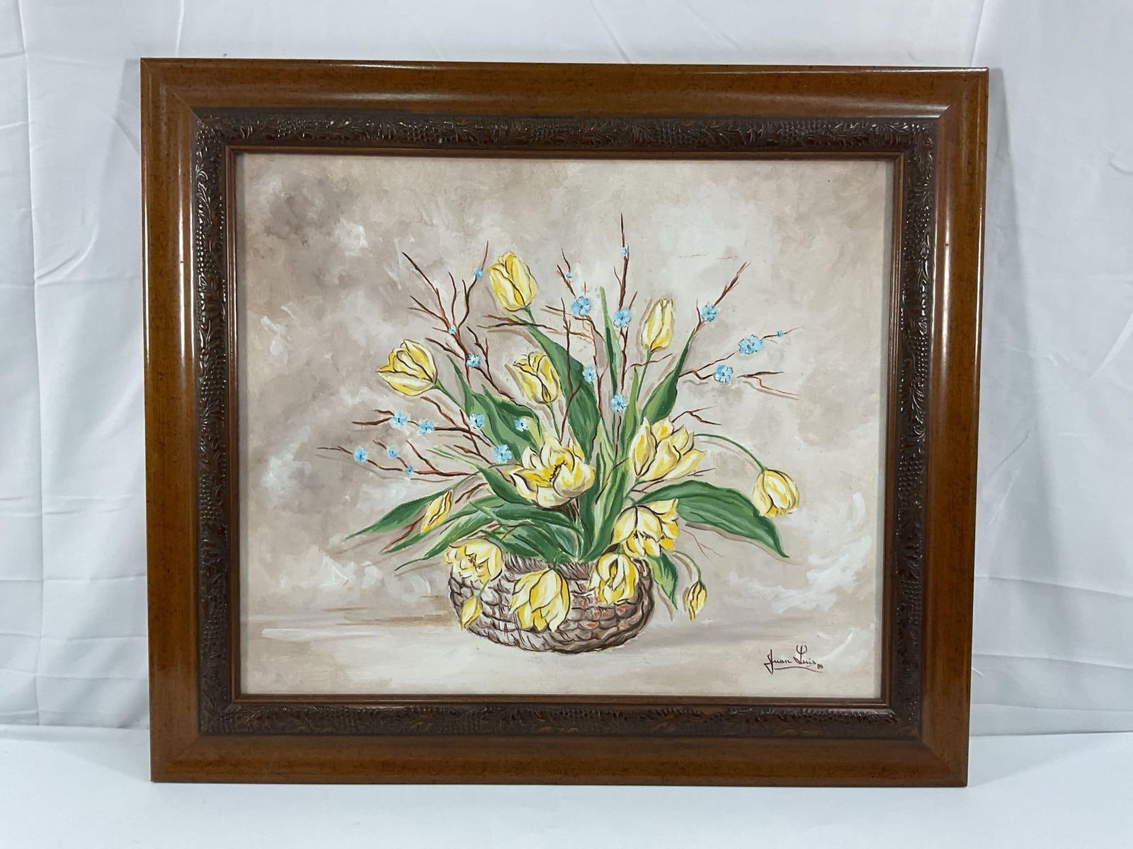 Original Floral Painting on Canvas, signed by the Artist Juan Luis: This is a framed original floral painting on canvas, signed by the artist Juan Luis and dated 1995. The painting features a bouquet of yellow flowers with green leaves and subtle blue accents, arrange