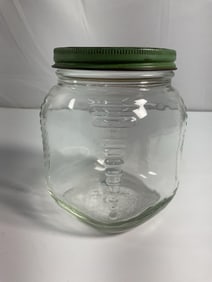 Vintage Ribbed Glass Jar with Green Metal Lid