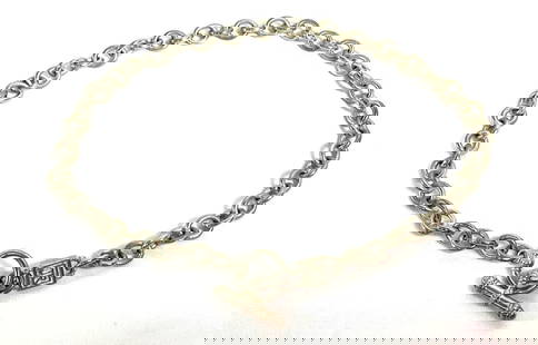 Judith Ripka Sterling Silver Chain Necklace with Toggle Clasp: A heavy sterling silver chain necklace by Judith Ripka, featuring a bold, circular link design and a signature toggle clasp with intricate rope detailing. The rectangular tag bears the "JR" logo, conf