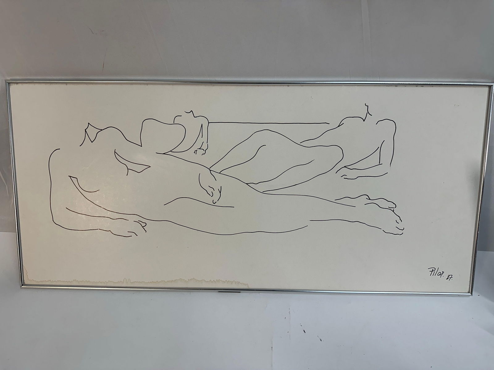 Pilar Bustos (Ecuador, b.1945) Ink Drawing: This artwork features a minimalist line drawing of two reclining nude figures. Pilar Bustos' signature style shines through in the use of clean, continuous lines that define the relaxed and natural fo
