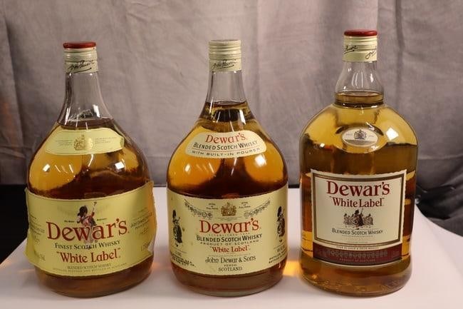 (3) Dewars White Label 1.75 liter each: Dewar's "White Label" Blended Scotch Whisky is a celebrated classic that has remained a symbol of quality since its creation in 1899. Known for its smooth, balanced flavor profile, this bl