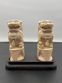 Pair of Carved Chinese Foo Dog Statues