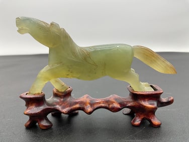 Carved Jade Horse Figurine on Wooden Stand