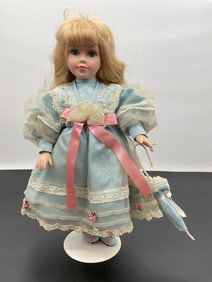 Porcelain Doll in Blue Victorian-Style Dress