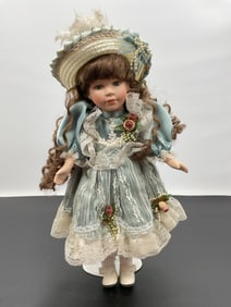 Porcelain Doll in Blue Lace Dress with Straw Bonnet