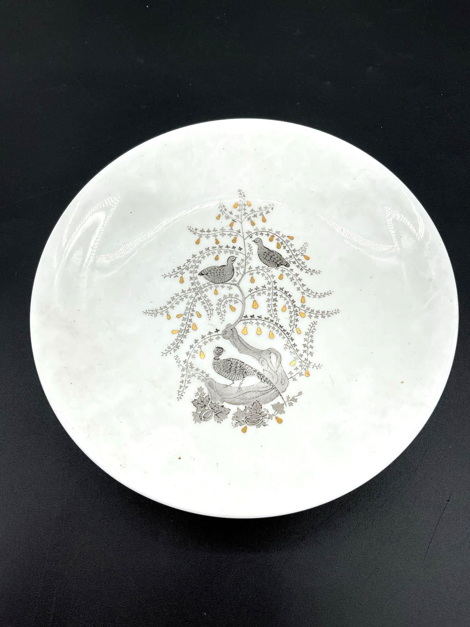 Wedgwood Fine Bone China Plate – "Tree of Life" Design: A decorative fine bone china plate by Wedgwood featuring a stylized “Tree of Life” motif. The central design includes birds perched within a flowering tree, accented with fine black and gold d