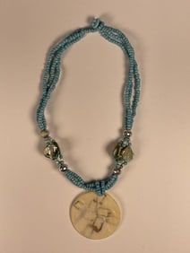 Handcrafted Turquoise Beaded Necklace with Bone like pendant
