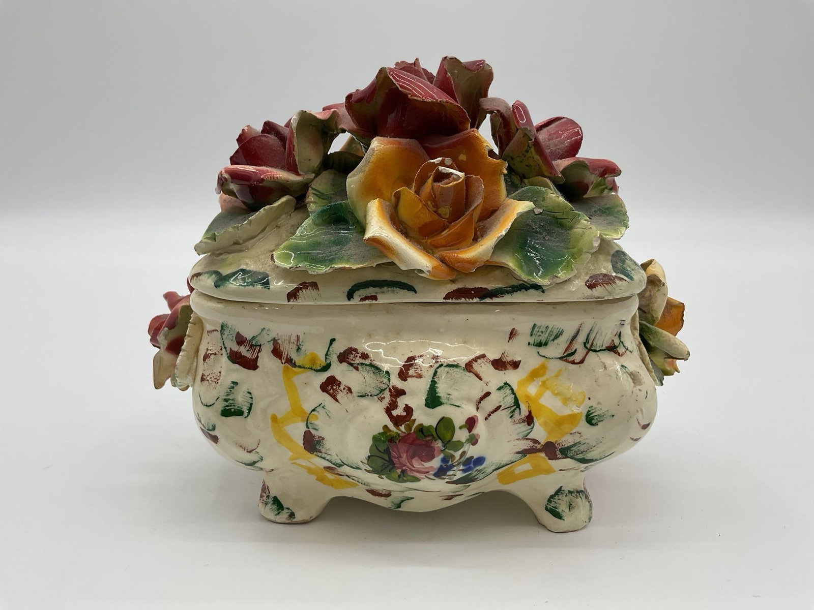 Vintage Italian Capodimonte-Style Floral Porcelain Box, Signed Pauls: Handcrafted Italian porcelain lidded box decorated with colorful hand-applied flowers and vibrant painted details. Features sculptural roses and foliage atop the lid. Marked “Italy Pauls” on t