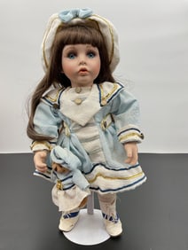 Porcelain Doll in Blue and White Sailor Dress with Bear