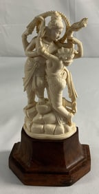 Carved Hindu dancing couple sculpture