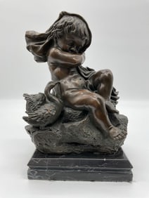 Bronze Sculpture of Sleeping Cherub on Rock with Bird