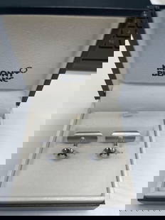 Montblanc Star Logo Cufflinks: Elegant pair of Montblanc cufflinks featuring the iconic white star emblem on black resin, set in polished stainless steel. Comes in original Montblanc presentation box. Dimensions: L3in W3in Medium:
