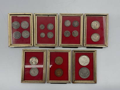 Set of seven framed Collection of Historic U.S. Currency Coins: Set of seven miniature frames with gold trim, each containing 2 to 4 coins displayed against red velvet. The coins are different historical U.S. currencies Dimensions: H4in L3in each