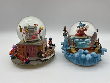 Pair of Disney and Macy’s Parade Snow Globes