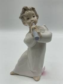 Lladro "Angel with Flute" porcelain figurine