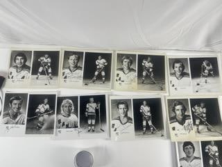 Collection of Signed NY Rangers Hockey Player Photographs: A collection of vintage hockey player photographs, some signed. The photos appear to be promotional or press-issued team photographs. The images feature players in action or posed shots wearing team u