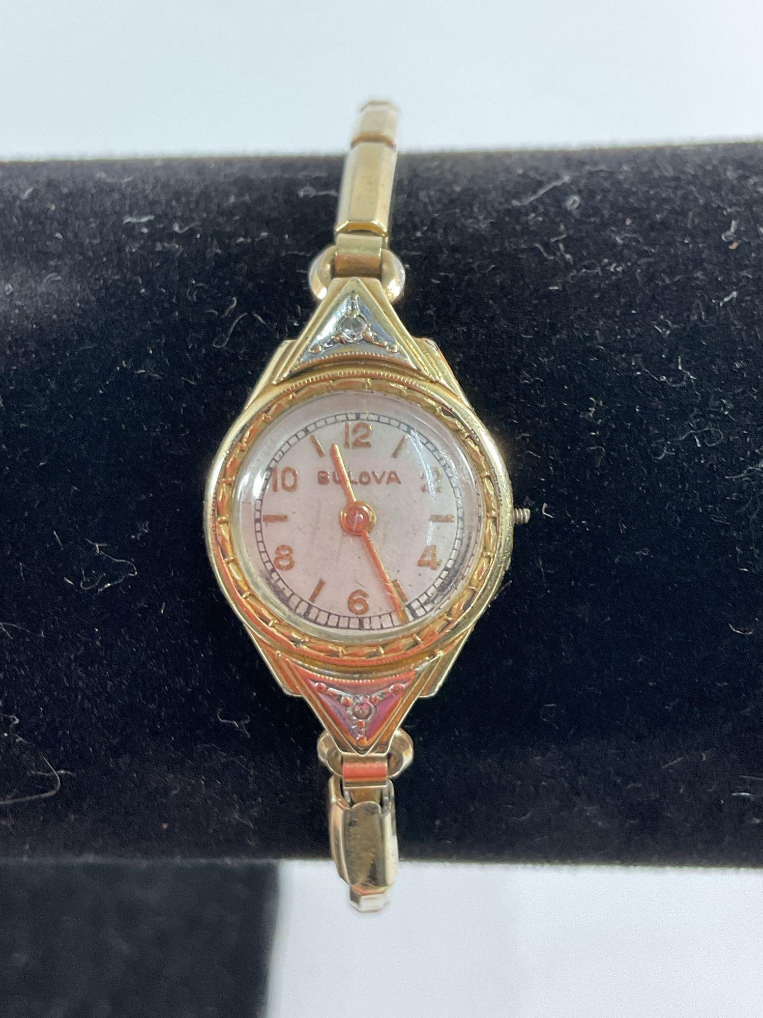 Vintage Ladies’ Wristwatch - Bulova: This is a vintage Bulova ladies’ wristwatch, featuring an elegant gold-tone case with a delicate design, reflecting the Art Deco or Mid-Century aesthetic. Bulova was one of the leading American watc
