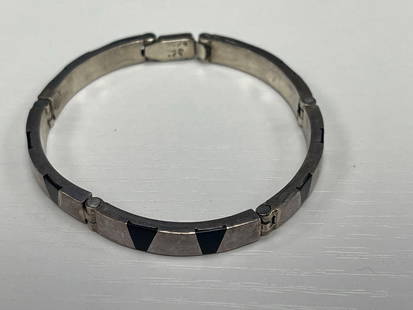 Mexican Sterling Silver Inlay Link Bracelet: Vintage hinged bracelet marked .925, crafted from sterling silver with black geometric inlay details across each link. Likely of Mexican origin, mid-20th century, featuring a subtle modernist