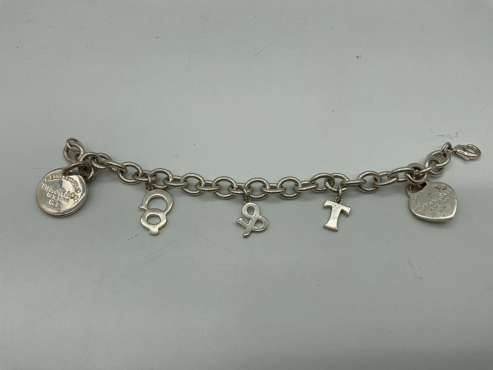 Tiffany & Co. Sterling Silver Charm Bracelet with Tags and Letters (1 of 5)