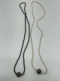 Black and White Beaded Necklace with Ornate Silver-Tone Accents