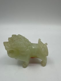Carved Pale Green Jade-Style Foo Dog