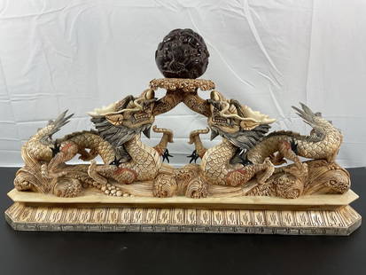 Bone Dragons: Carved bone dragons holding ornately carved amber ball Dimensions: H14in L25in W7in