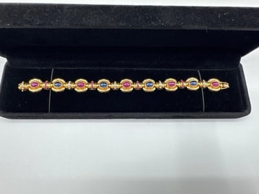 18kt Gold Bracelet with Diamonds and Ruby and Sapphire Cabochon stones