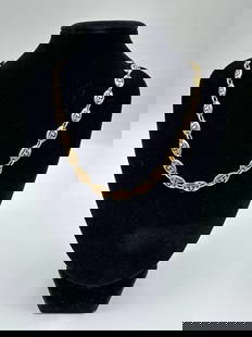 18kt Gold Designer Link Necklace Signed Jean Paris Zodiac Sign: This elegant designer necklace is crafted in solid 18kt yellow gold and stamped by Jean Paris. Jean Paris was a designer for both Cartier and Van Cleef & Arpels and Trifari. The piece features a serie