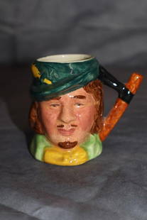 Lancaster Sandland Porcelain Mug: Lancaster Sandland English porcelain, Robin Hood character, miniature Toby Mug. Dimensions: H:2.75in