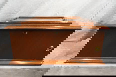 Antique-Style Wooden Music Box: This beautifully crafted music box with a polished wooden case features a lid adorned with a charming hand painted pastoral scene. It showcases a serene countryside setting with trees, water and figur