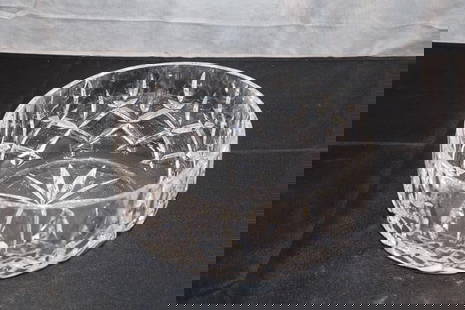 Crystal Bowl: This is a stunning etched crystal bowl showcasing intricate hand-cut patterns and exceptional craftsmanship. Perfect for use as a centerpiece or to display fruits, this bowl reflects light beautifully
