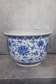 blue and white plant holder