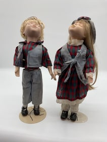 Vintage Porcelain Doll Pair – Boy and Girl in Plaid Outfits