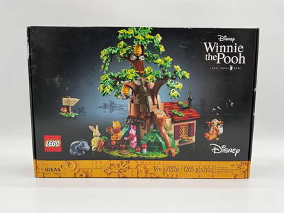 RETIRED LEGO Disney Winnie the Pooh Set 21326: LEGO Ideas set featuring Winnie the Pooh’s house under a large tree in the Hundred Acre Wood. Includes minifigures of Pooh, Piglet, Tigger, Rabbit, and Eeyore. Set contains 1,265 pieces and is