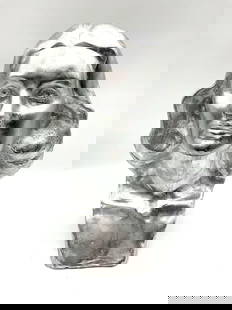 STEIN, Modest - Metallic Female Bust - 1956: Expressive sculptural bust of a woman, finished in a reflective silver metallic coating. The piece features stylized facial features and softly flowing hair, combining classical influence with a moder