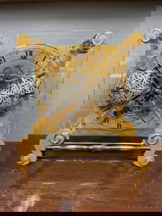 Roger Cornet “Horlogerie d’Art?? Skeleton Mantel Clock: Description: An exquisite limited edition skeleton clock by Roger Cornet, renowned for his French “horlogerie d’art&rdquo; (art clockmaking). This intricate timepiece features a clear glass dial w