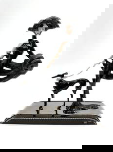Erté "Symphony in Black" Figurine: Striking Art Deco-style sculpture by Erté featuring an elegant woman in a sleek black gown and elaborate headdress, walking a greyhound on a silver leash. Richly detailed with a high-gloss finish and