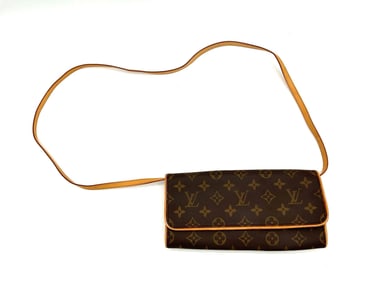 Louis Vuitton Monogram Pochette Clutch Coated canvas and leather trim