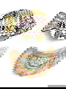 MacKenzie-Childs Hand-Painted Ceramic Dishes – Fish and Melon: Whimsical ceramic serving dishes shaped like a fish and a melon slice, both featuring the brand’s signature pastel colors, checkerboard accents, and floral detailing. Marked “MacKenzie-Childs, Mad