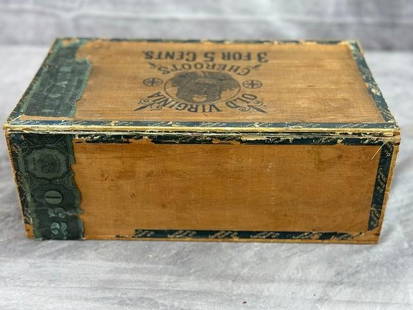"Old Virginia" Cheroots Cigar Box: This is a vintage wooden "Old Virginia" Cheroots cigar box. The box features intricate branding on the lid and sides, reflecting its historical significance and craftsmanship. Its weathered patina sho