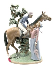 Lladro Jockey with Lass Porcelain Figurine