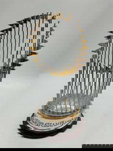 2003 Florida Marlins World Series Trophy Replica: A replica of the 2003 World Series Trophy, commemorating the Florida Marlins&#39; championship victory over the New York Yankees. The trophy features the iconic gold and silver pennants of all MLB tea