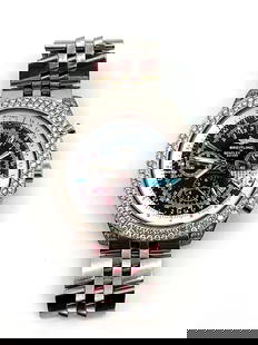 Breitling for Bentley Motors Modele Depose Chronograph Watch with Diamond Bezel and Case: This luxury chronograph features a bold black dial with multiple subdials and a date window, encased in a bezel fully encrusted with clear stones. The intricate face includes tachymeter and 24-hour ma