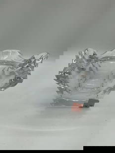 Contemporary Hand-Molded Crystal Bowl: Description: Small freeform crystal bowl with wavy rim and a square base. Modern design, ideal for candy or decorative use. Dimensions: H:4in L:7in W:7in