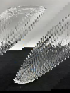 Large Waterford Crystal Ribbed Vase: Elegant large vase by Waterford, crafted in clear crystal with vertical ribbed cuts and a traditional rounded form. Known for its brilliant clarity and weight, this piece reflects Waterford&#39;s reno