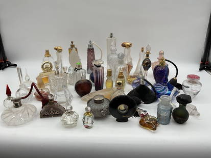 Assorted Vintage and Decorative Perfume Bottles Collection: Description: Large mixed lot of vintage and decorative perfume bottles, including atomizers, cut glass stoppers, iridescent finishes, and art glass designs. Includes mid-century to modern styles with