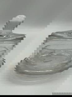 Small Clear Glass Butter Dish with Lid: Description: Compact lidded butter or condiment dish featuring a rounded knob handle and flat base. Unmarked. Clear pressed glass. Dimensions: H:4in Dia:4in